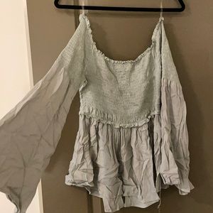 Mint green off the shoulder shirt with flared sleeves
